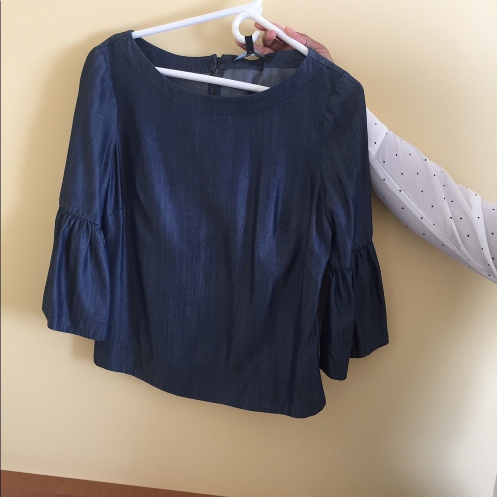 Denim trumpet sleeve top!